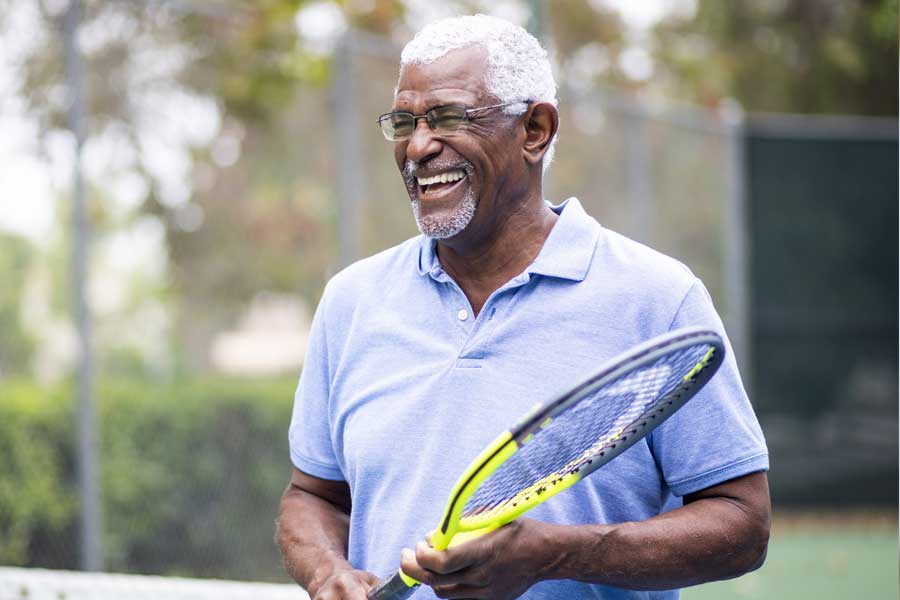 Senior-aged male and female independent living residents of Residence at Wellpoint running on trails